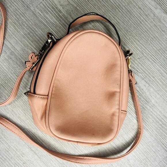 Pink mini purse with gold zipper and accents. - Picture 10 of 13